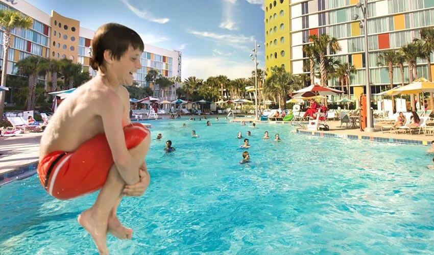 A child jumping into a pool.