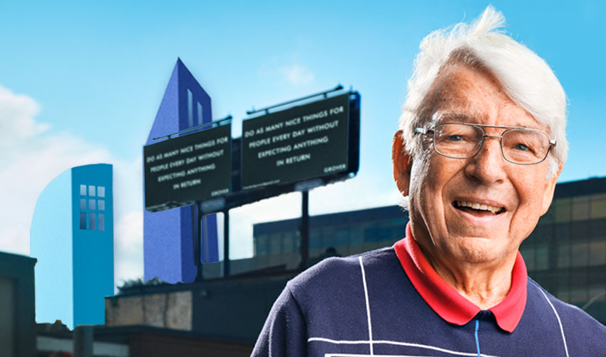 Man standing in front of buildings