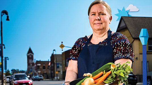 Woman with pot and vegetables