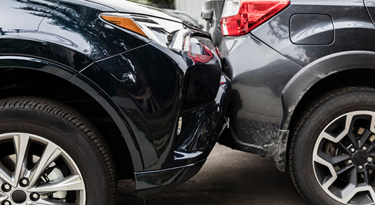 Damaged bumpers from car accident