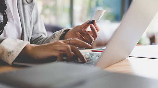 Woman making credit card payment