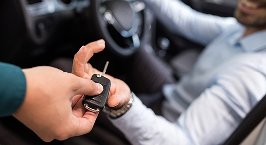 Man receiving car keys