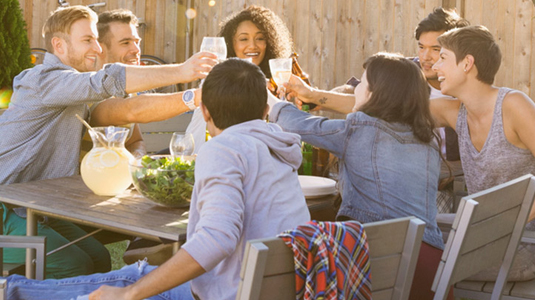 Backyard friends cheers lemonade