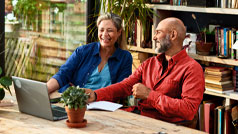 Couple using a laptop